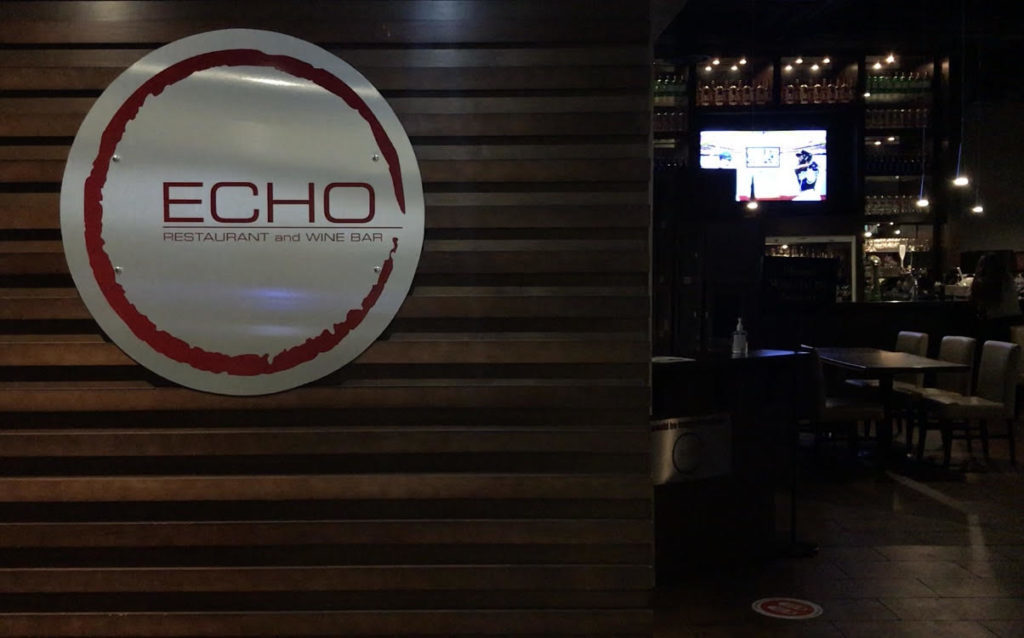 Sign reading "Echo Restaurant and Wine Bar"