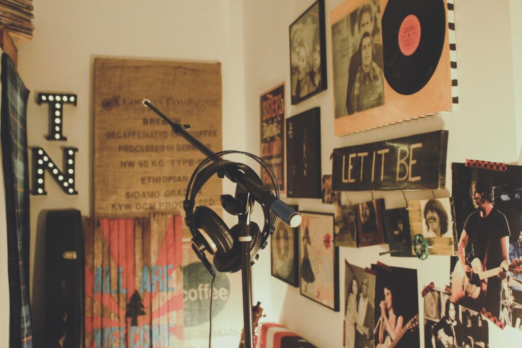 headphones and microphone stand in decorated bedroom