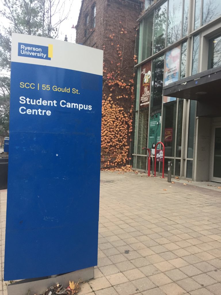 A sign on Ryerson's campus that says "SCC 55 Gould St. Student Campus Centre"