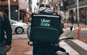 Uber Eats motorcyclist delivers food