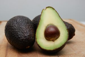Avocados on a cutting board.