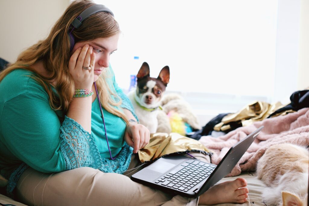 Stressed girl looking at her computer.